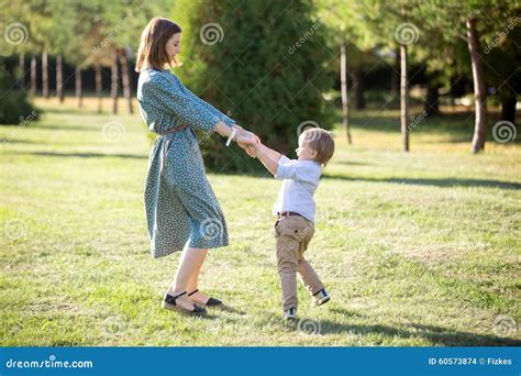 son playing with mom